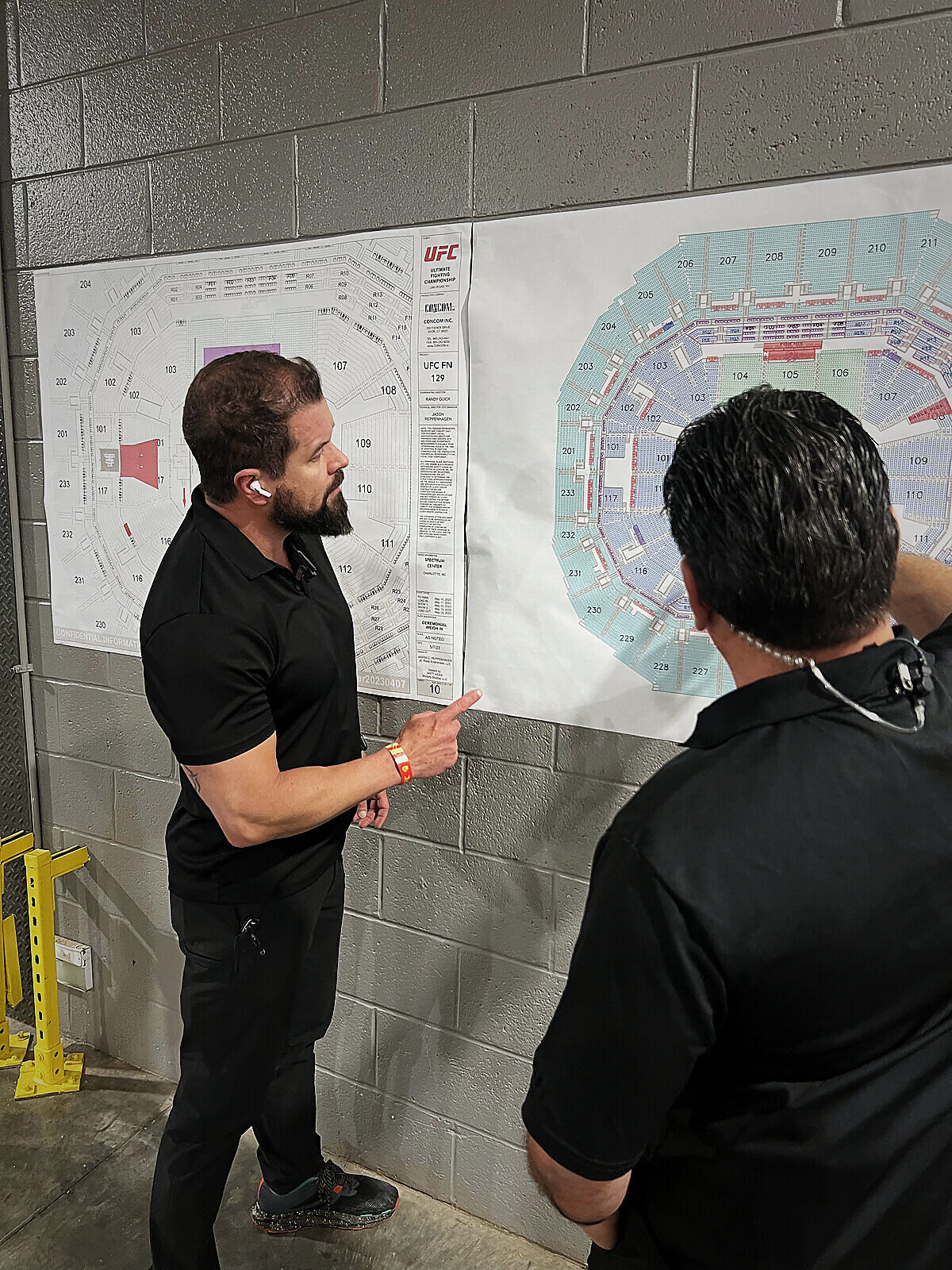Jan-Lee team reviewing a venue map while planning security